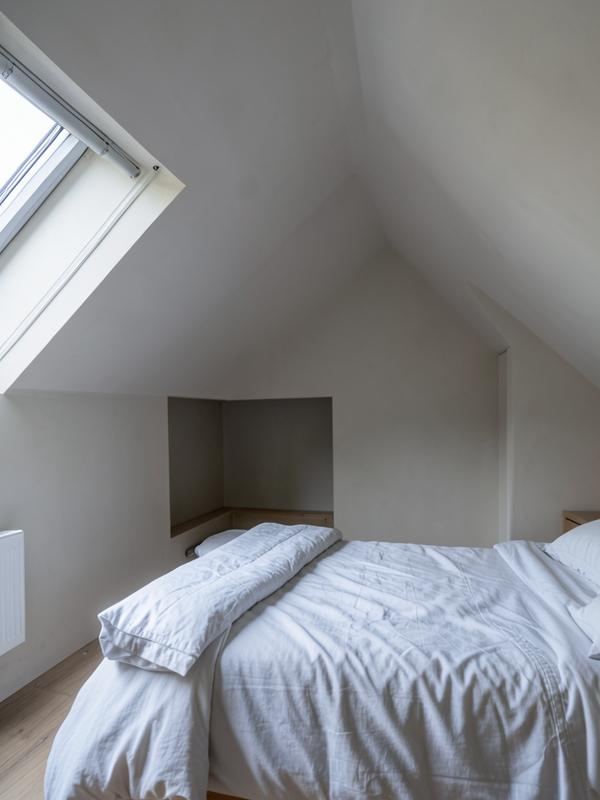 Loft bedroom with a sloping ceiling in Abercynon before fitted wardrobes